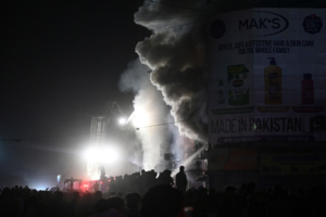 The death toll from the Karachi fire in Pakistan has risen to 21, with 60 people still missing