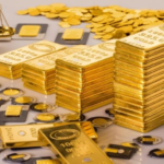 Gold prices fell as the dollar strengthened and profit-taking ensued