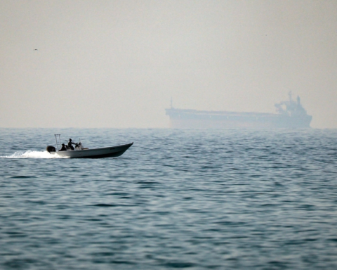 An oil tanker sank in the Strait of Hormuz after being targeted, and the waterway was closed